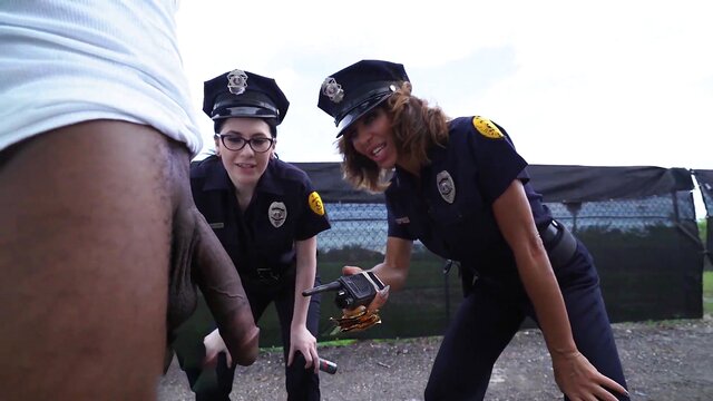 Lucky Suspect Gets Ravaged by Two Busty Female Cops in Steamy Interrogation